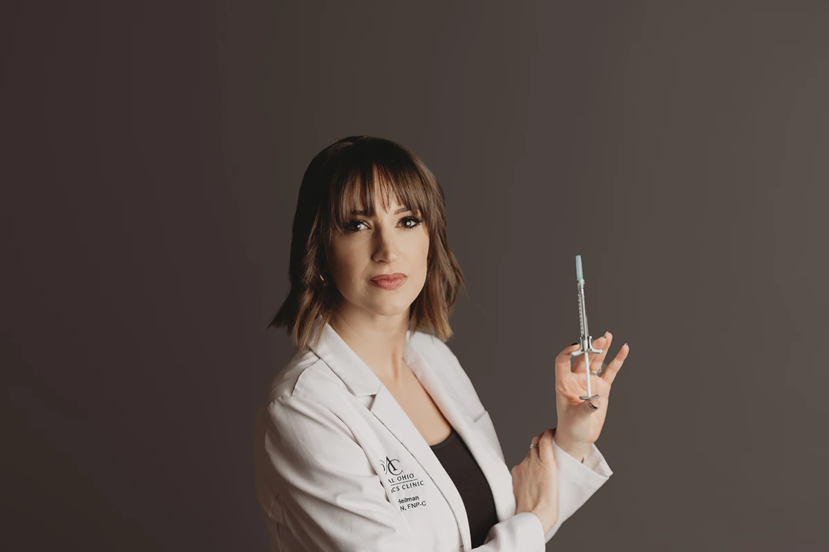 Nurse practitioner holding a Injectables syringe at Central Ohio Aesthetics Clinic in Powell, Ohio